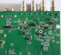 Mainboard with added BNC ports (bottom view, close-up of the GPS antenna section)
